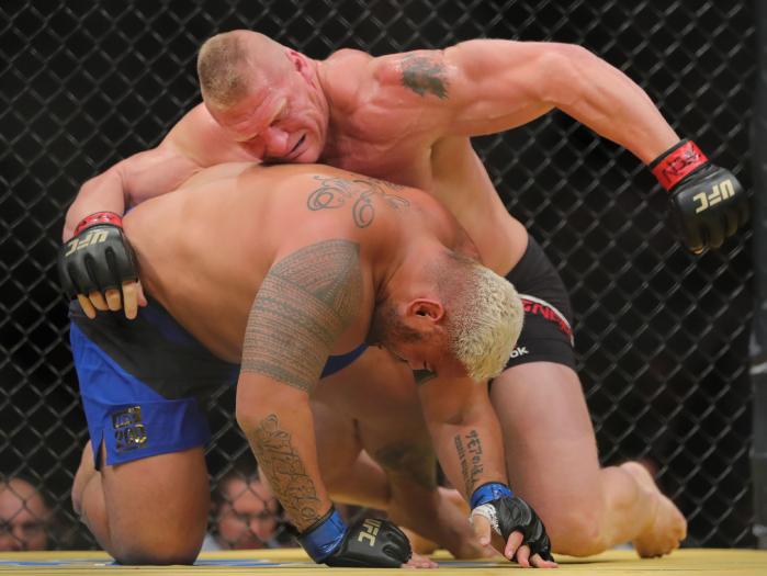Brock Lesnar controlling Mark Hunt in his win at UFC 200